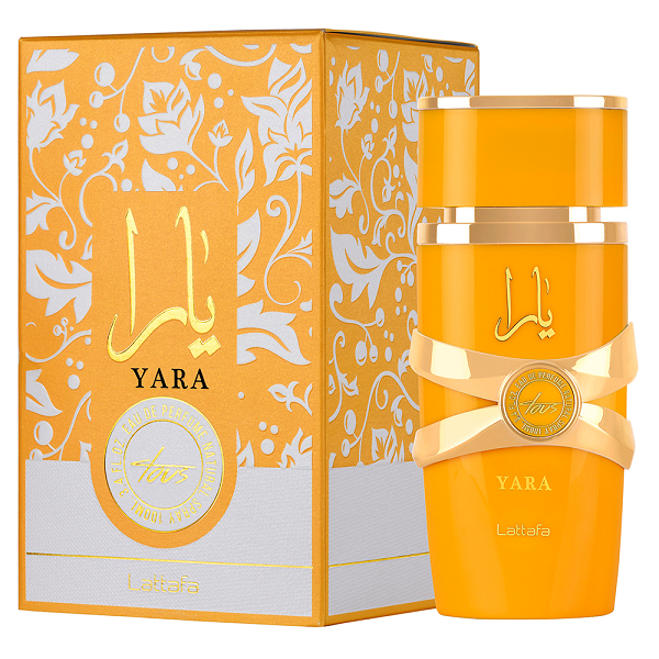 Botella de perfume Lattafa Yara Tous para mujer de 3.4 oz, con un diseño cilíndrico de color dorado y tapa en forma de corona.