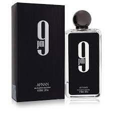 Botella de perfume Afnan 9 PM para hombre, de 3.4 oz, con un diseño negro y detalles dorados en la base y el nombre de la marca en el frente.