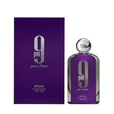 Botella de perfume Afnan 9 PM para mujer, de 3.4 oz, con un diseño de vidrio rosa claro y una tapa plateada en forma de joya.