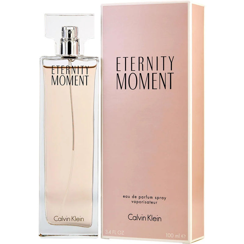 Botella de perfume Calvin Klein Eternity Moment de 3.4 oz para mujer, con un diseño de vidrio rosa claro.
