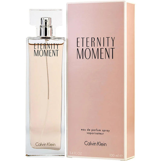 Botella de perfume Calvin Klein Eternity Moment de 3.4 oz para mujer, con un diseño de vidrio rosa claro.