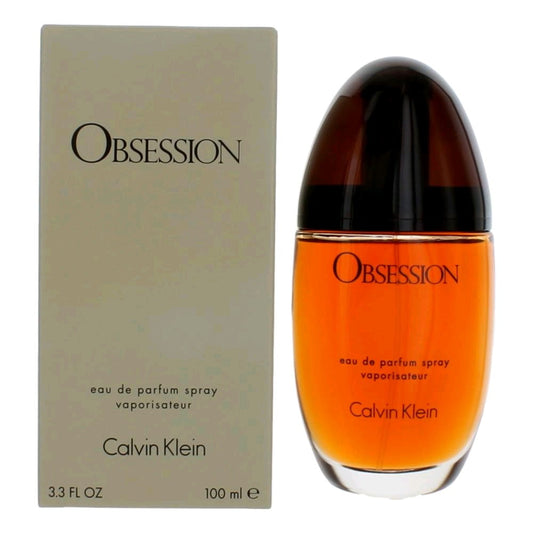 Botella de perfume Calvin Klein Obsession de 3.3 oz para mujer, con un diseño ovalado y ámbar.