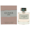 Botella de perfume Guess 1981 de 3.4 oz para mujer, con un diseño de vidrio esmerilado y un logo metálico.
