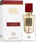 Botella de perfume Lattafa Ana Abiyedh Rouge de 2.04 oz, con un diseño de vidrio rojo mate y una tapa transparente.