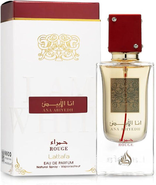 Botella de perfume Lattafa Ana Abiyedh Rouge de 2.04 oz, con un diseño de vidrio rojo mate y una tapa transparente.