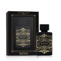 Botella de perfume Lattafa Bade'e Al Oud For Glory de 3.4 oz, con un diseño de vidrio de color púrpura oscuro y una tapa dorada.