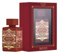 Botella de perfume Lattafa Bade'e Al Oud Sublime de 3.4 oz, con un diseño de vidrio rojo oscuro y una tapa dorada.