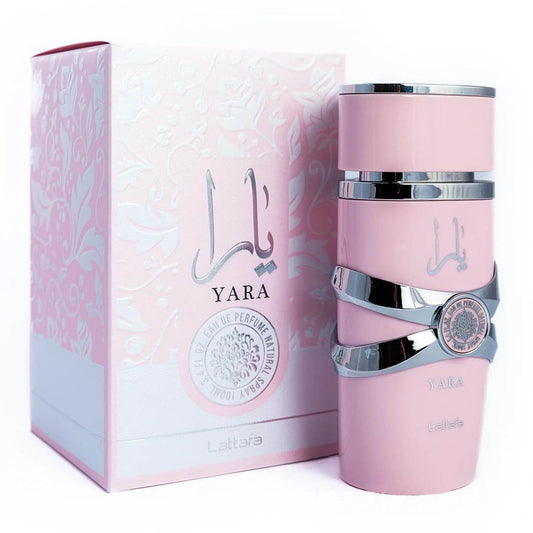 Botella de perfume Lattafa Yara para mujer de 3.38 oz, con un diseño cilíndrico de color rosa pastel y tapa en forma de corona.