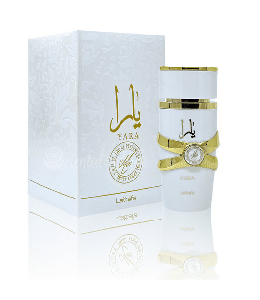 Botella de perfume Lattafa Yara Moi para mujer de 3.4 oz, con un diseño cilíndrico de color beige y tapa en forma de corona.