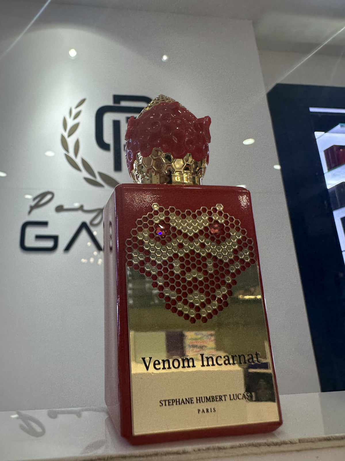 Foto real en tienda Perfumería García, Plaza Luperón