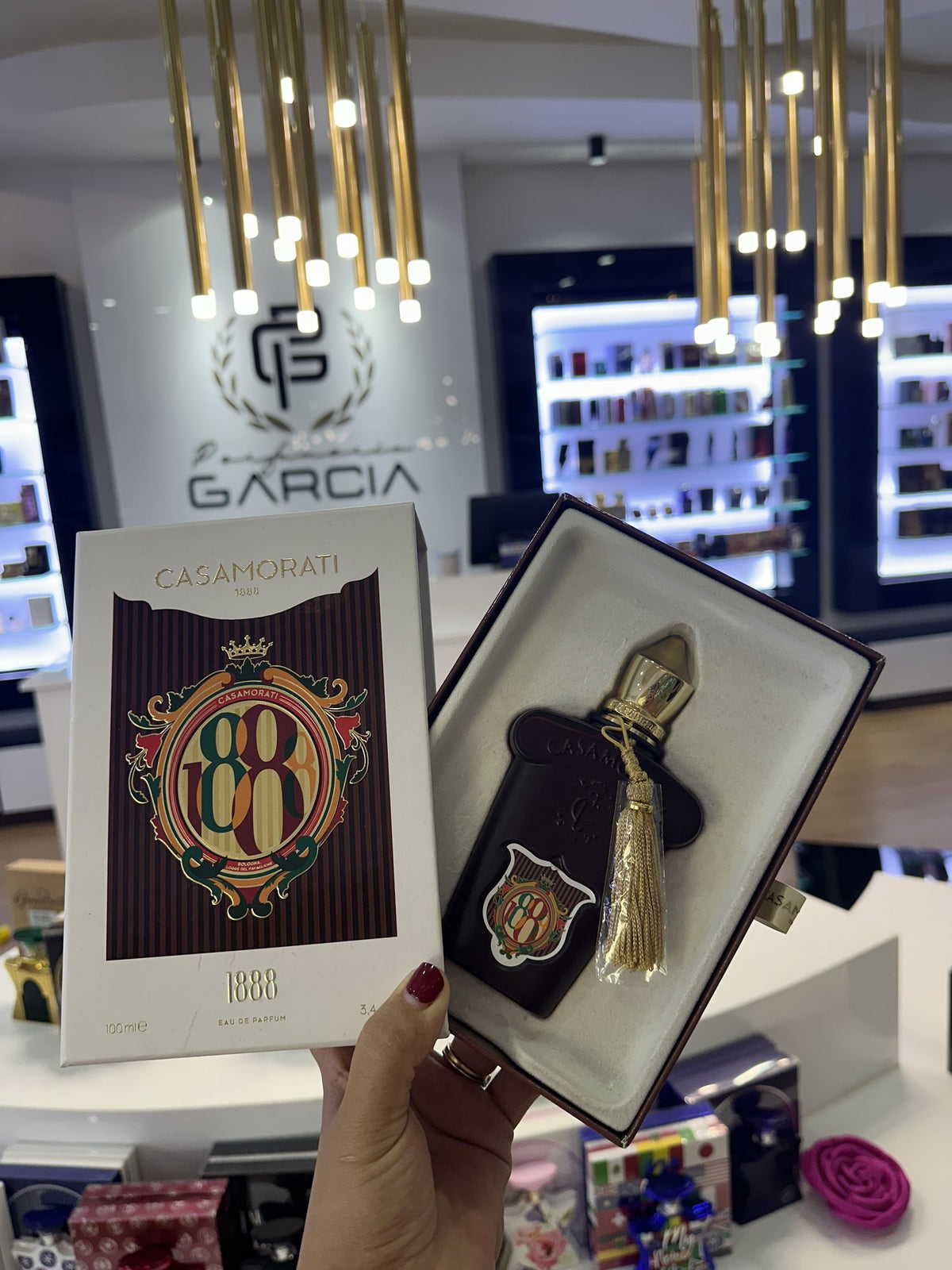 Foto real en tienda Perfumería García, Plaza Luperón